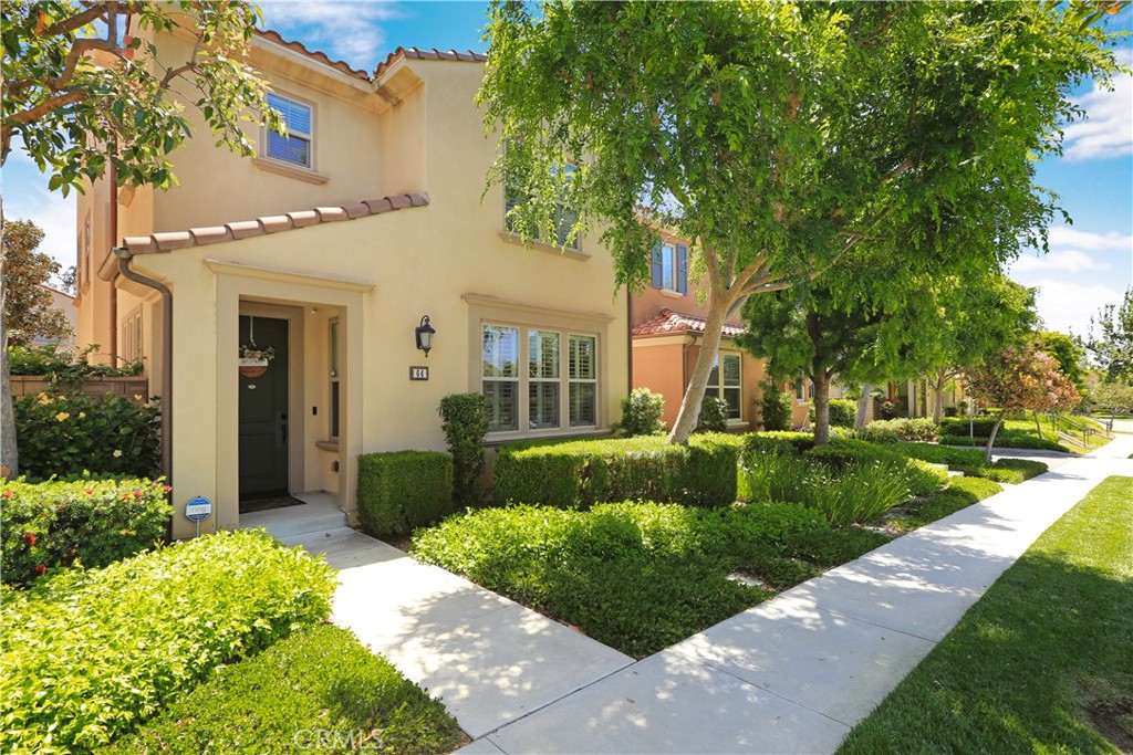 64 Prickly Pear Irvine, CA 92618 - Photo 2 of 35 a front view of a house with a yard