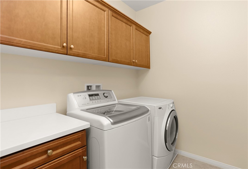 64 Prickly Pear Irvine, CA 92618 - Photo 23 of 35 a utility room with dryer and washer