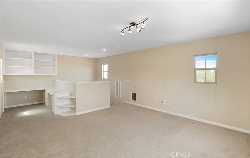 64 Prickly Pear Irvine, CA 92618 - Photo 24 of 35 a view of an empty room with a window