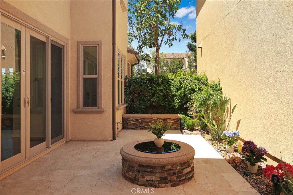 64 Prickly Pear Irvine, CA 92618 - Photo 28 of 35 a view of a living room and a yard