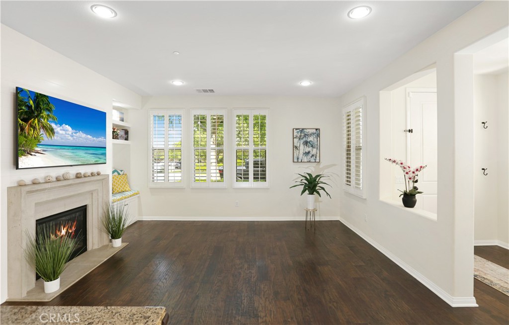 64 Prickly Pear Irvine, CA 92618 - Photo 3 of 35 an empty room with windows and fireplace