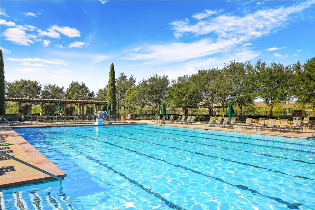 64 Prickly Pear Irvine, CA 92618 - Photo 31 of 35 a view of a swimming pool with an outdoor seating