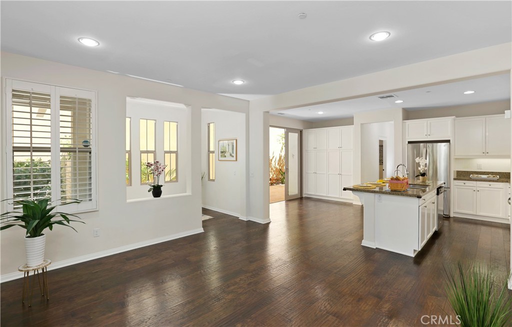 64 Prickly Pear Irvine, CA 92618 - Photo 4 of 35 a large kitchen with a table and chairs in it