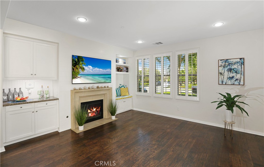64 Prickly Pear Irvine, CA 92618 - Photo 6 of 35 a living room with furniture fireplace and wooden floor