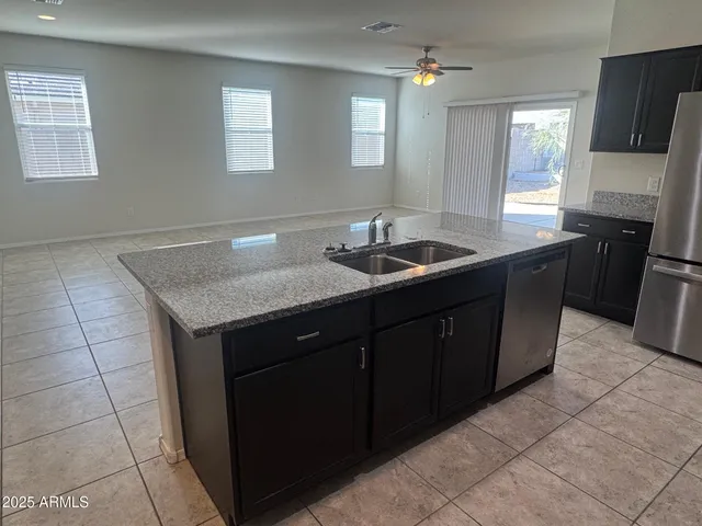 a view of an empty room and a window