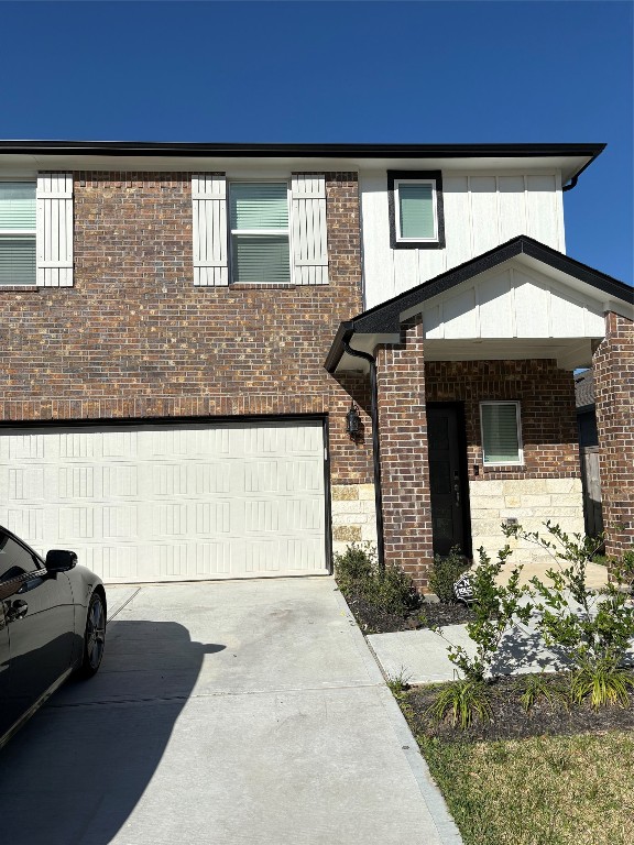 16628 Sterling Clf Street Conroe, TX 77302 - Photo 13 of 14 a front view of a house with a yard