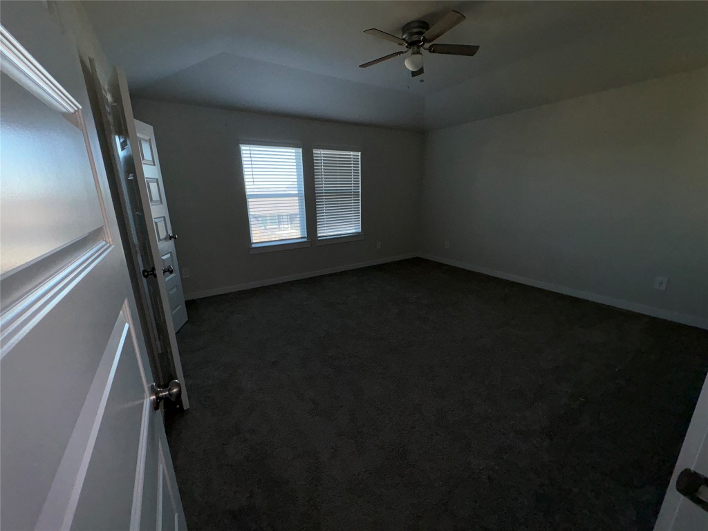 16628 Sterling Clf Street Conroe, TX 77302 - Photo 4 of 14 a view of an empty room with a window