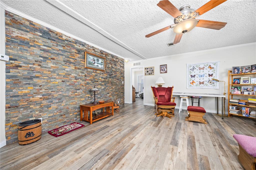 3964 288th Street Branford, FL 32008 - Photo 6 of 37 a living room with furniture and wooden floor