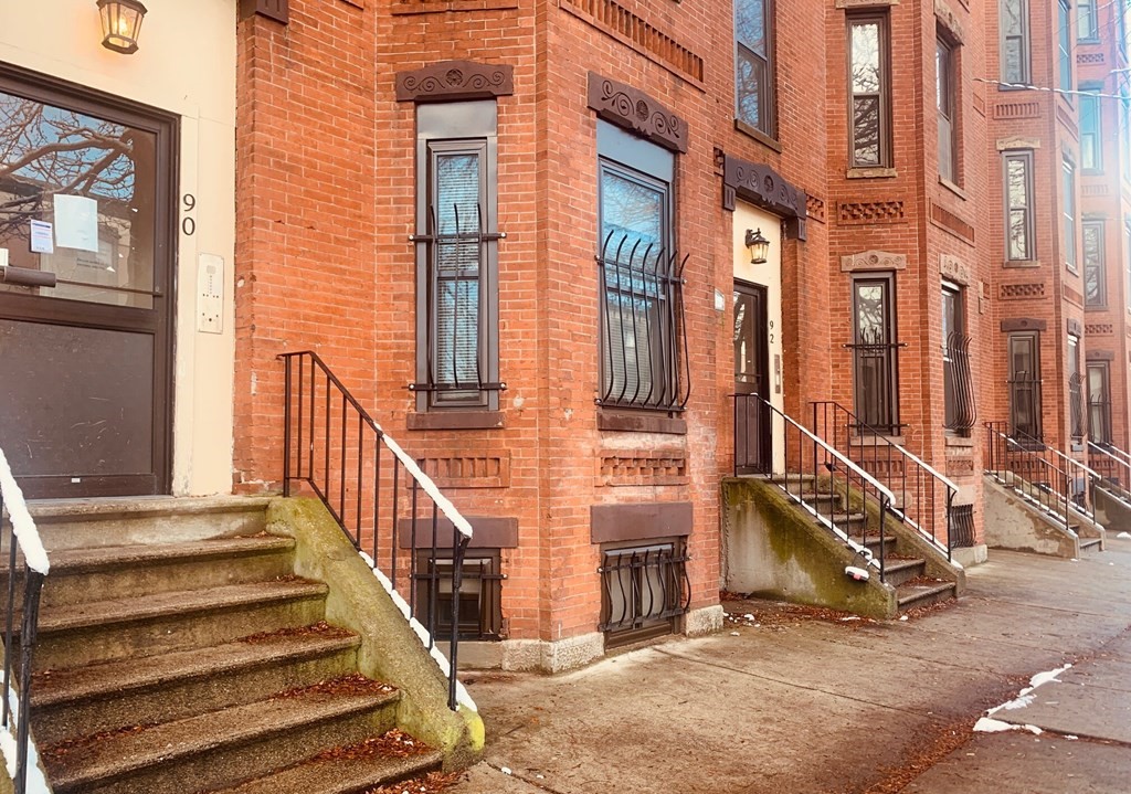 90 Hammond Street, Unit 5 Boston, MA 02120 - Photo 6 of 6 a view of a building with stairs