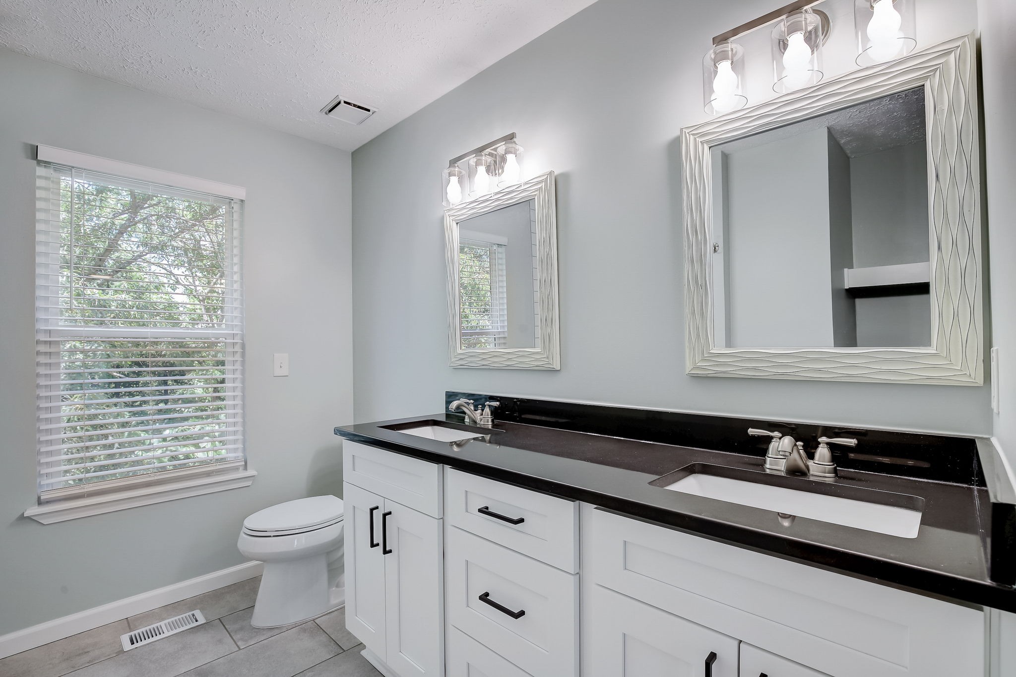 861 Bishopsgate Road Antioch, TN 37013 - Photo 20 of 33 a bathroom with a sink and a toilet