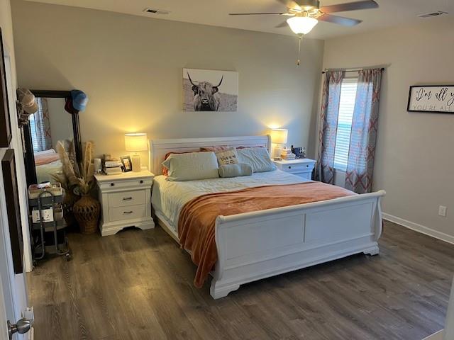 5 Willowrun Drive Rome, GA 30165 - Photo 25 of 43 a bedroom with a bed and a chandelier