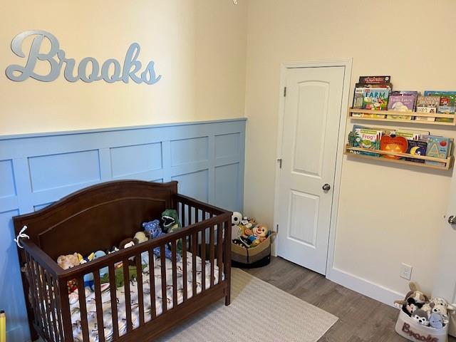 5 Willowrun Drive Rome, GA 30165 - Photo 39 of 43 a bedroom with a bed and wooden floor