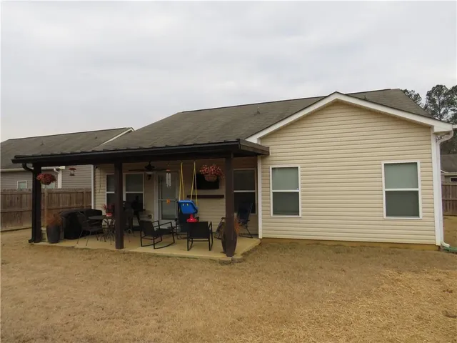 a view of a house with patio