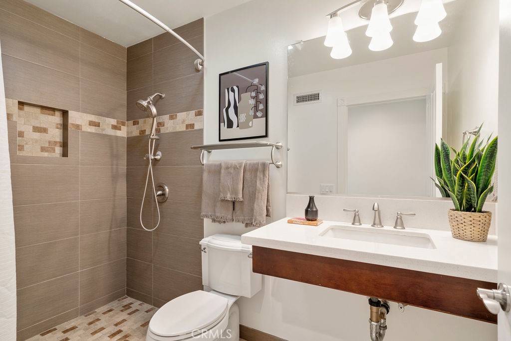 840 Rainbow Drive Glendora, CA 91741 - Photo 29 of 74 a bathroom with a sink toilet and shower
