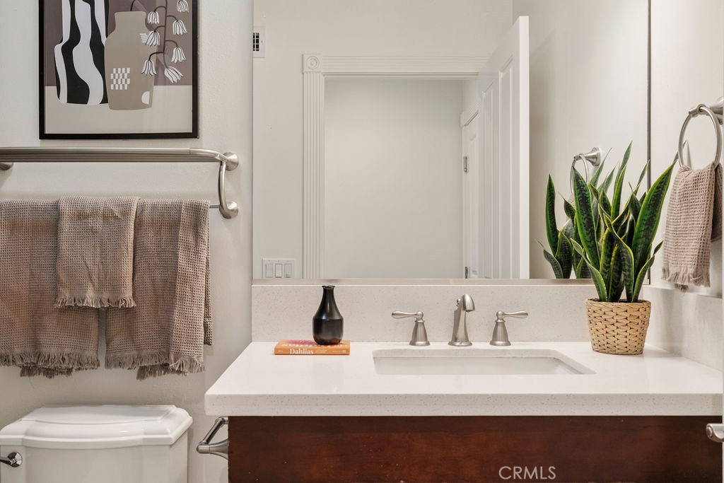 840 Rainbow Drive Glendora, CA 91741 - Photo 30 of 74 a bathroom with a sink a toilet and vanity