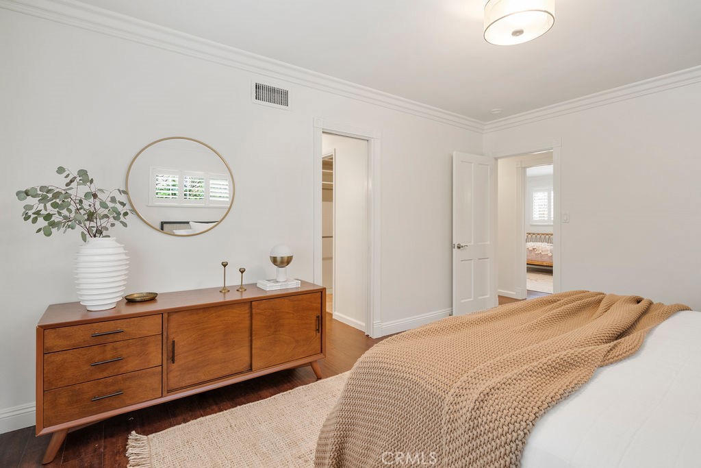 840 Rainbow Drive Glendora, CA 91741 - Photo 42 of 74 a bedroom with a bed mirror and a window