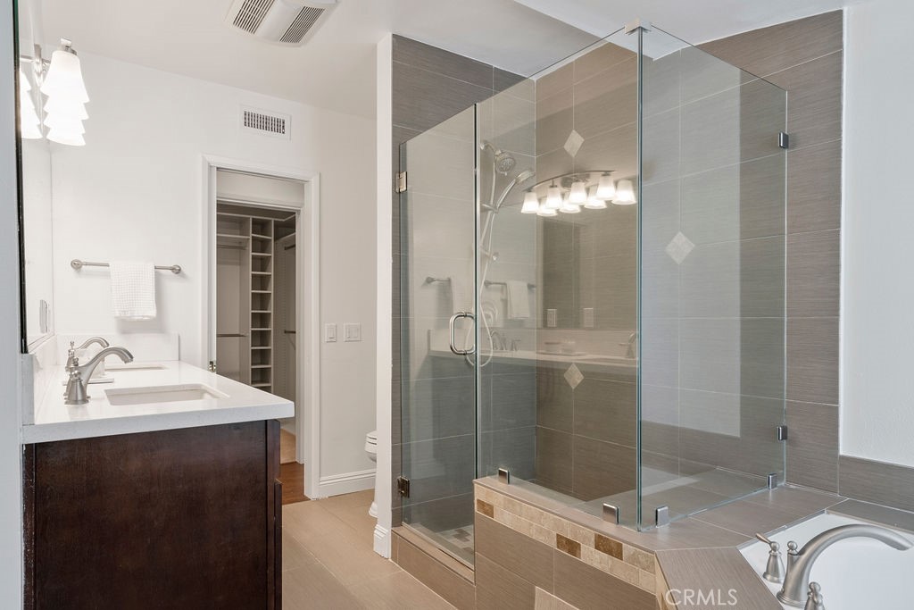 840 Rainbow Drive Glendora, CA 91741 - Photo 47 of 74 a bathroom with a sink a toilet and shower