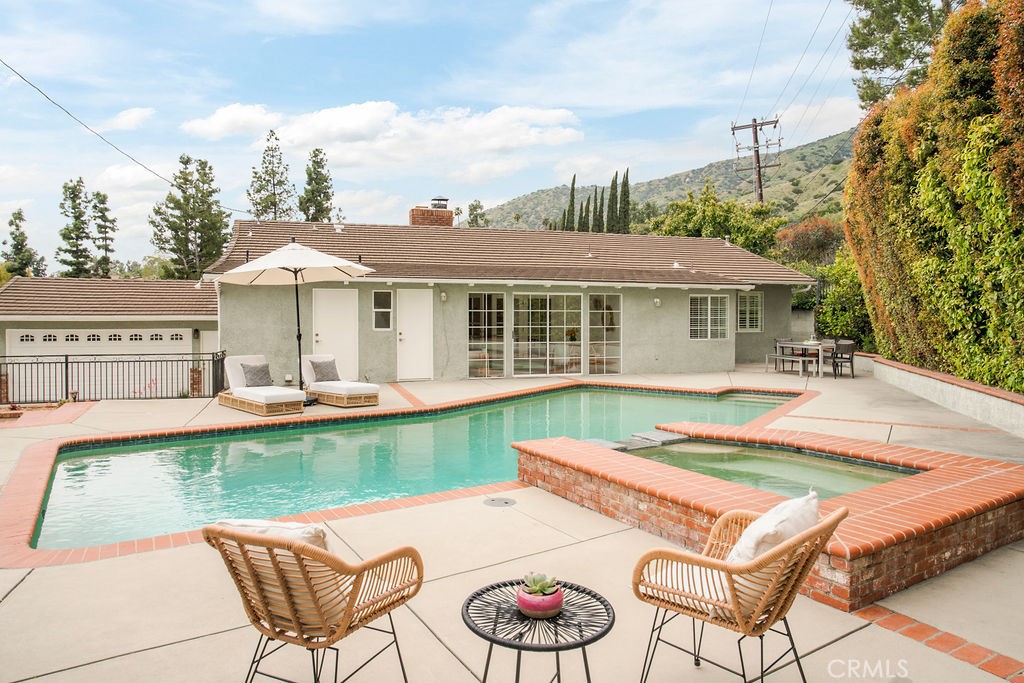 840 Rainbow Drive Glendora, CA 91741 - Photo 53 of 74 a view of a house with swimming pool and sitting area