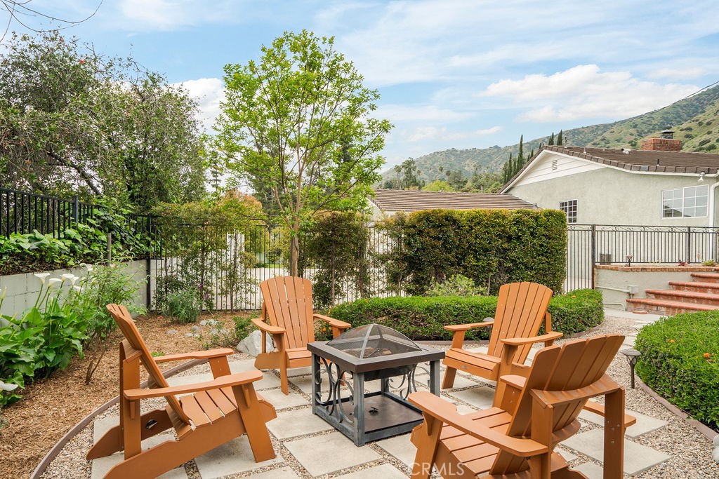 840 Rainbow Drive Glendora, CA 91741 - Photo 64 of 74 a view of backyard with seating space and trees