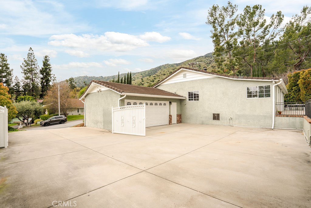 840 Rainbow Drive Glendora, CA 91741 - Photo 67 of 74 a view of a house with a yard and garage