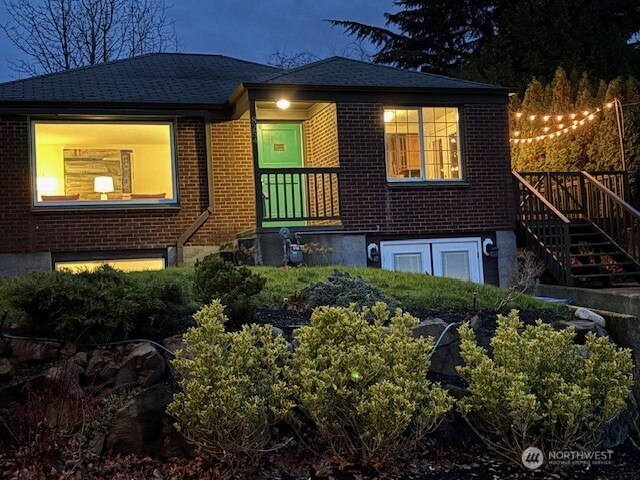 8254 Bagley Avenue North Seattle, WA 98103 - Photo 21 of 21 a view of a house with a flower garden