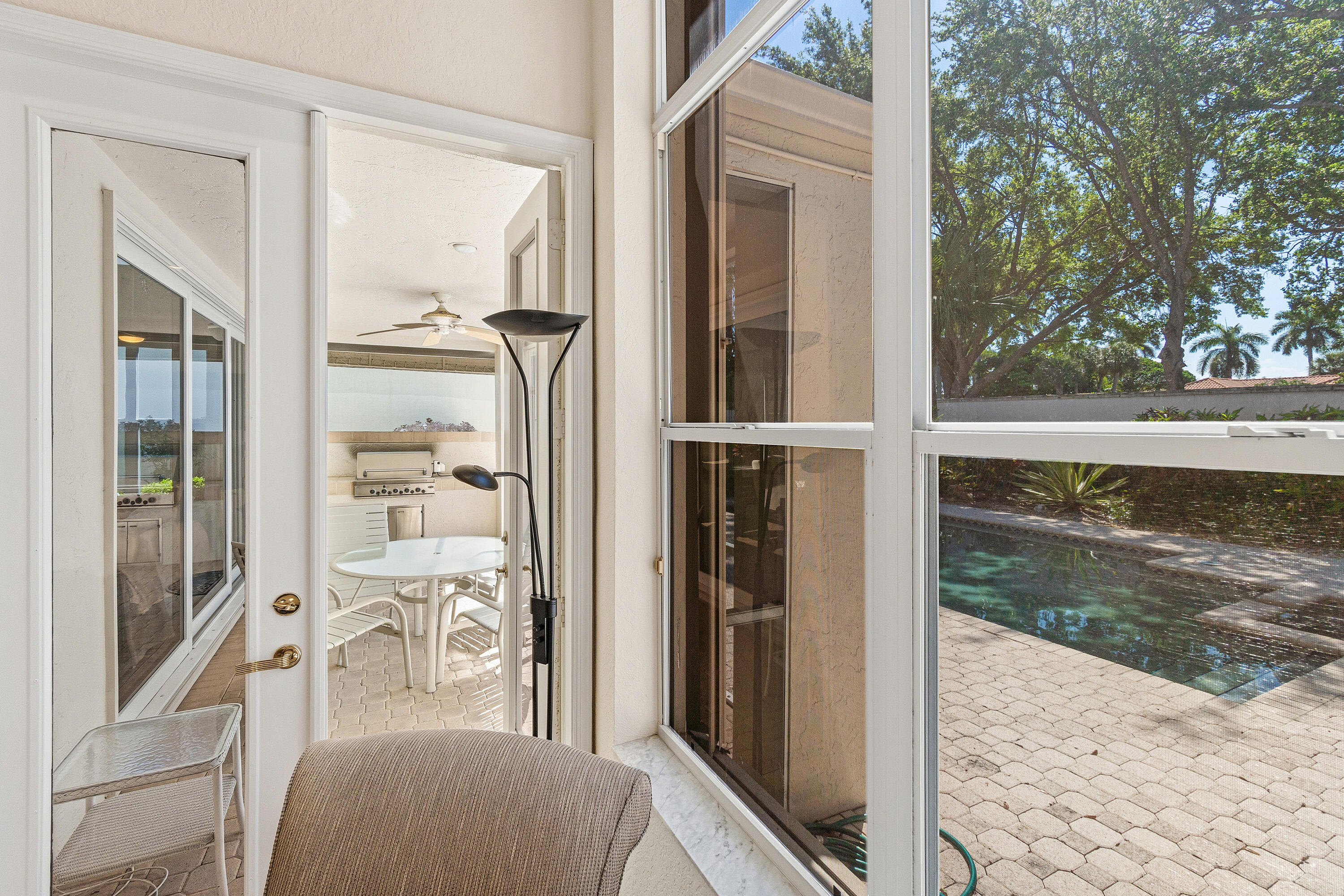 6213 Northwest 21st Court Boca Raton, FL 33496 - Photo 29 of 63 Primary Bedroom to Patio