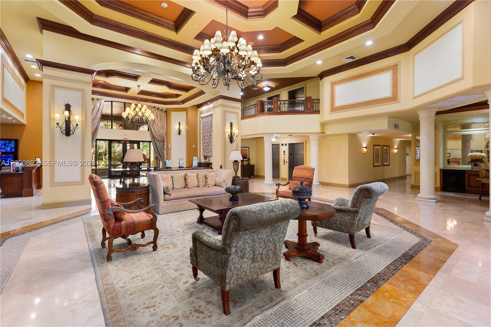 888 Douglas Road, Unit PH01 Coral Gables, FL 33134 - Photo 31 of 31 a living room with furniture a chandelier and a dining table