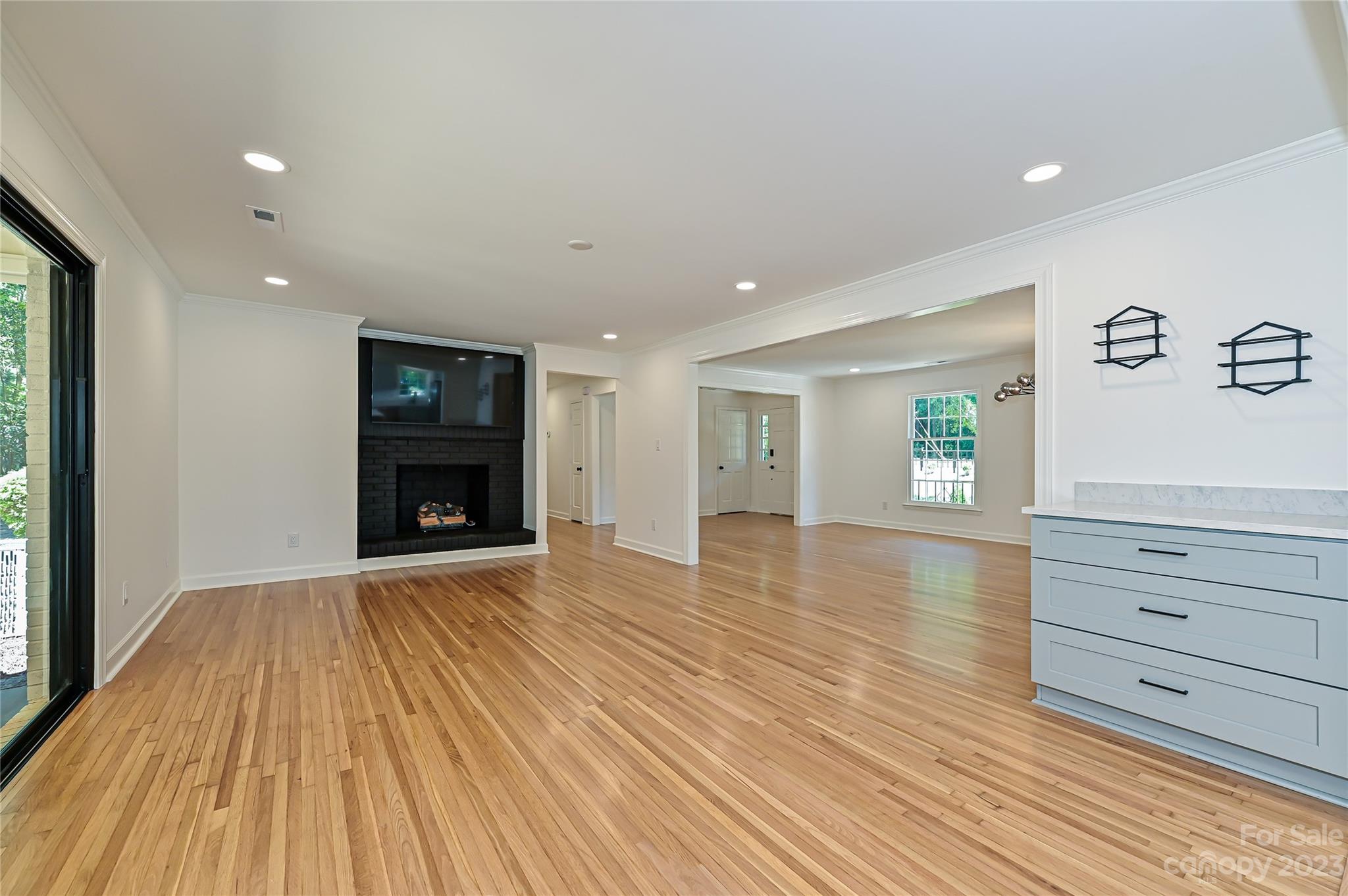 5024 Providence Road Charlotte, NC 28226 - Photo 12 of 39 a view of an empty room with wooden floor and a window