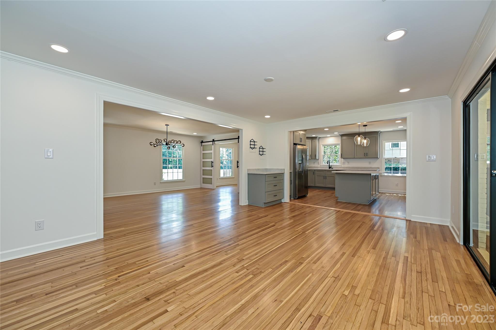 5024 Providence Road Charlotte, NC 28226 - Photo 13 of 39 a view of empty room with kitchen and window