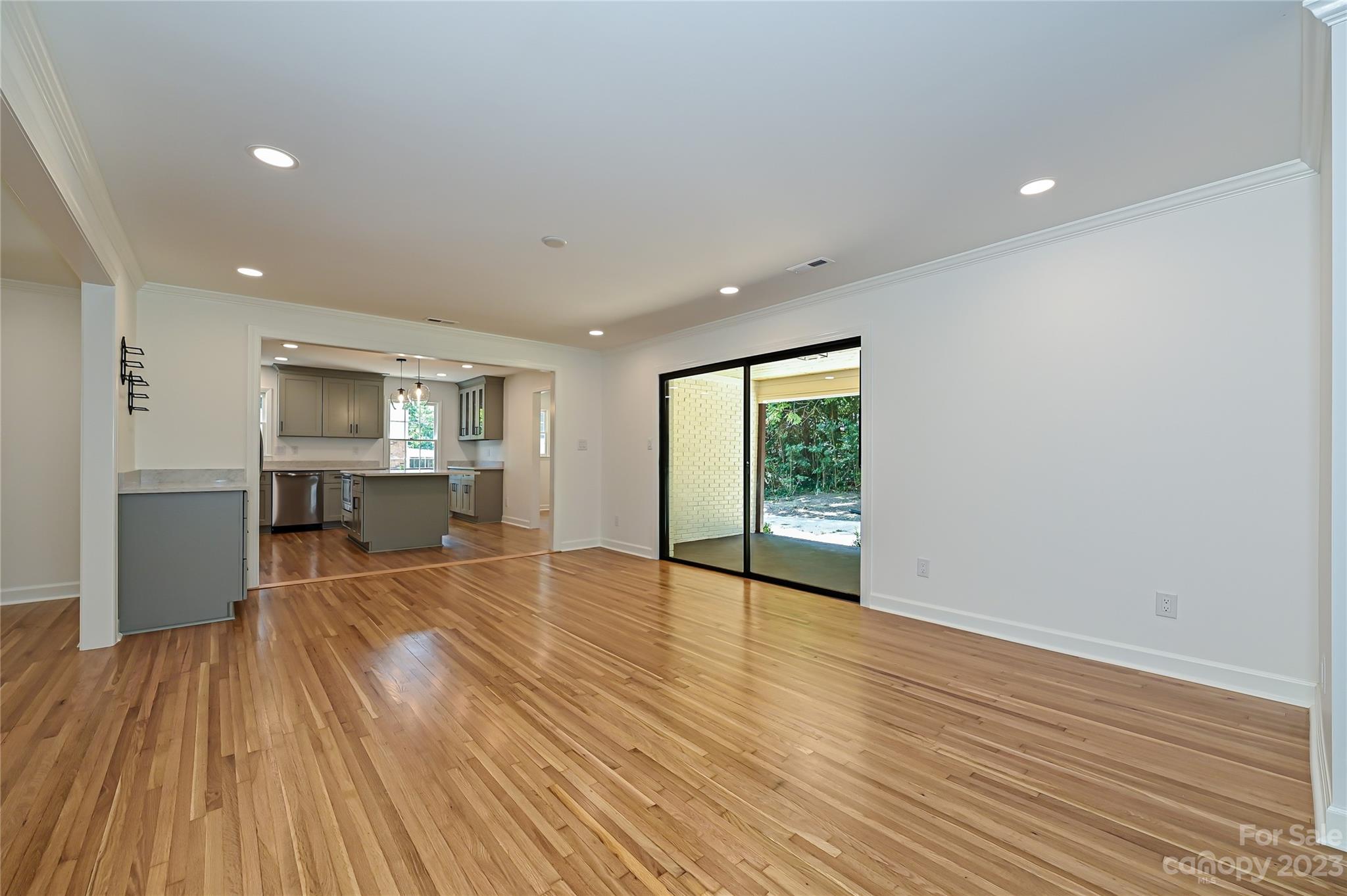 5024 Providence Road Charlotte, NC 28226 - Photo 14 of 39 a view of an empty room with wooden floor and a window