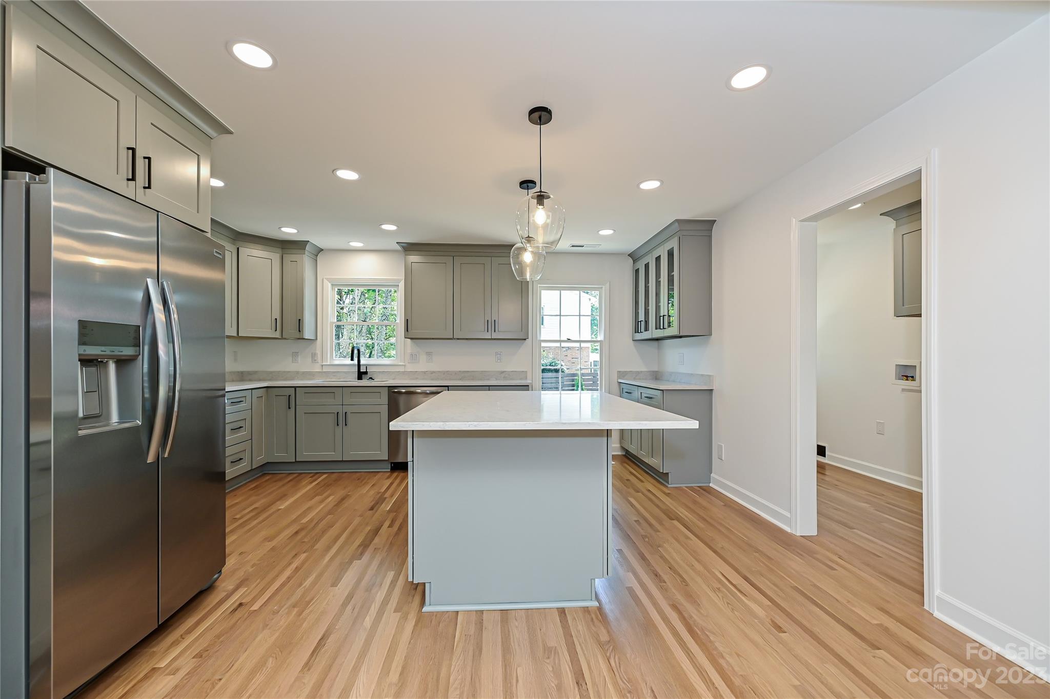 5024 Providence Road Charlotte, NC 28226 - Photo 16 of 39 a kitchen with a sink stainless steel appliances and cabinets