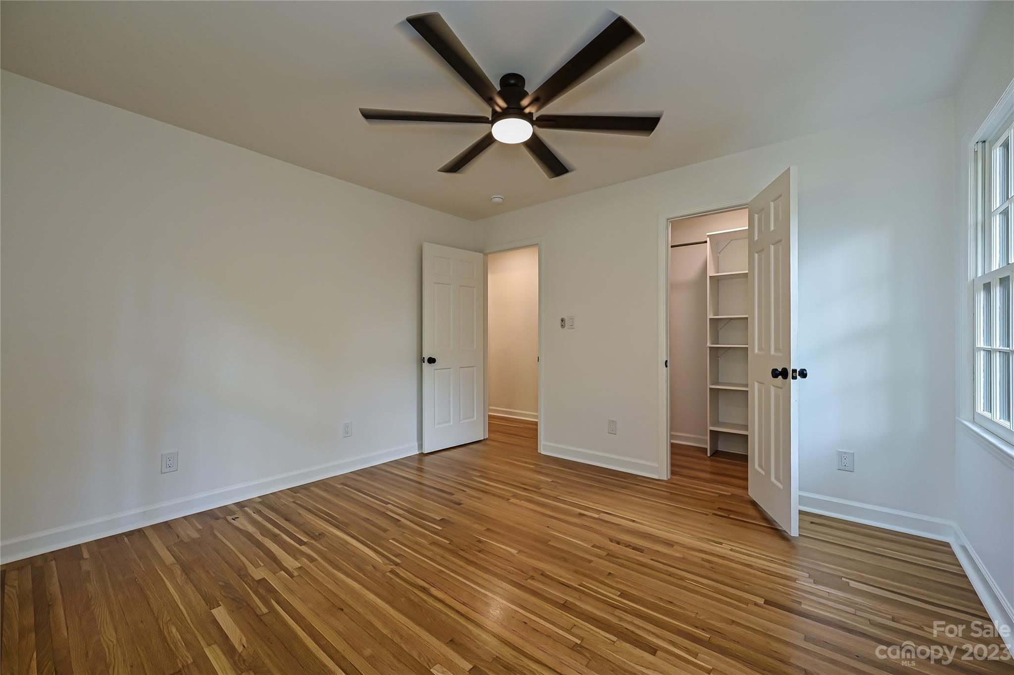 5024 Providence Road Charlotte, NC 28226 - Photo 33 of 39 a view of empty room with wooden floor
