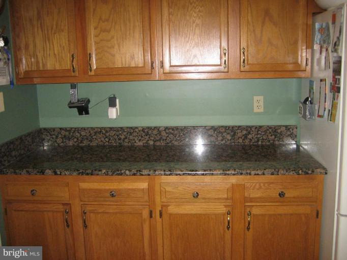 285 West Bay Front Road Lothian, MD 20711 - Photo 13 of 26 a view of cabinets and a microwave oven