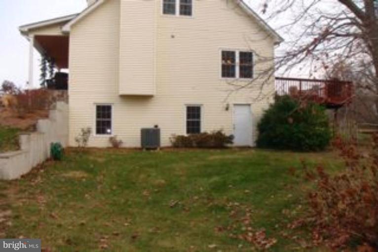 285 West Bay Front Road Lothian, MD 20711 - Photo 14 of 26 a house view with a backyard space