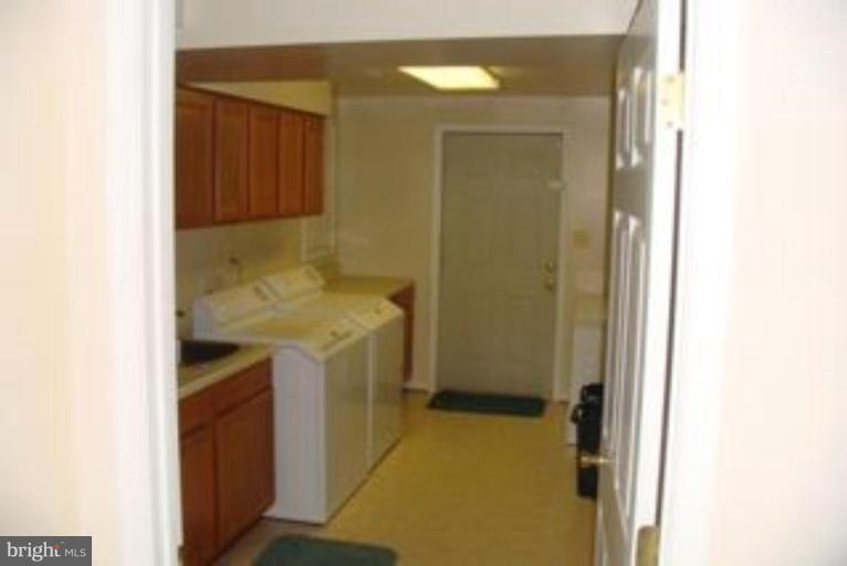285 West Bay Front Road Lothian, MD 20711 - Photo 20 of 26 a bathroom with a sink and a mirror