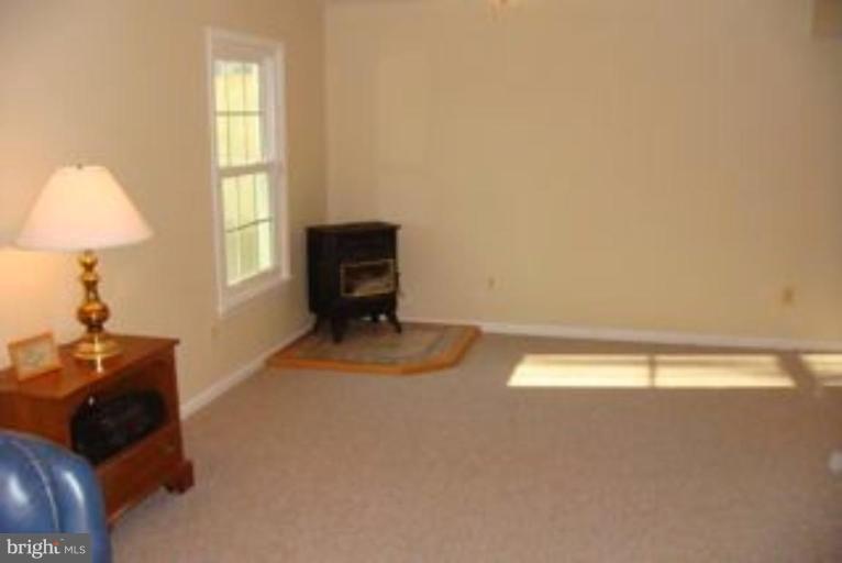 285 West Bay Front Road Lothian, MD 20711 - Photo 23 of 26 a room with a bed and a window
