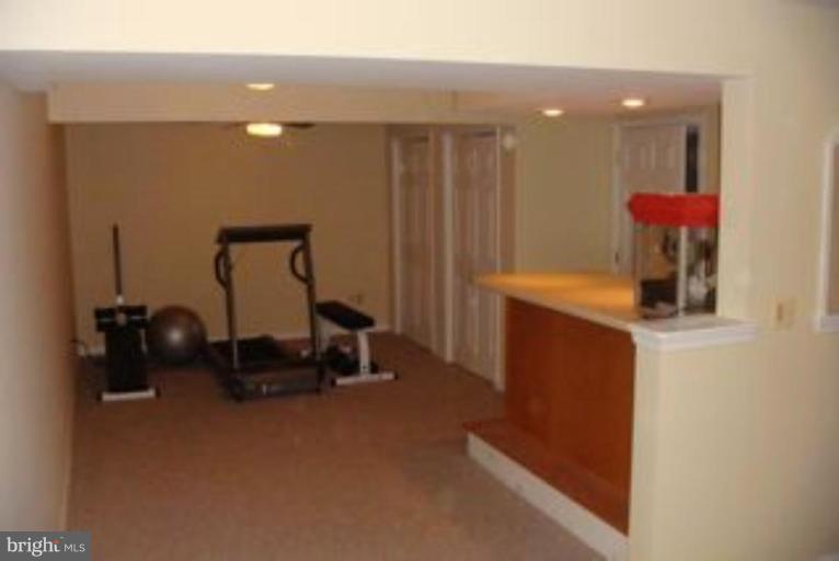 285 West Bay Front Road Lothian, MD 20711 - Photo 24 of 26 a room with furniture and a potted plant