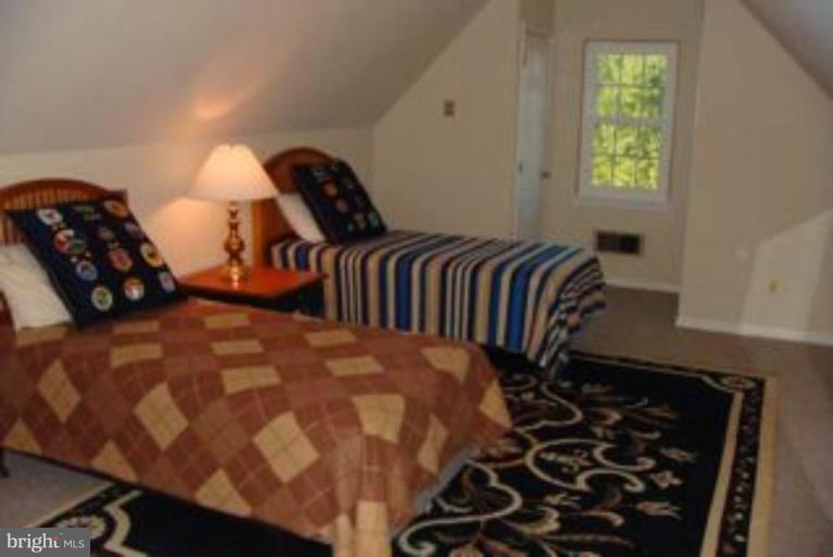 285 West Bay Front Road Lothian, MD 20711 - Photo 25 of 26 a bedroom with a bed and window