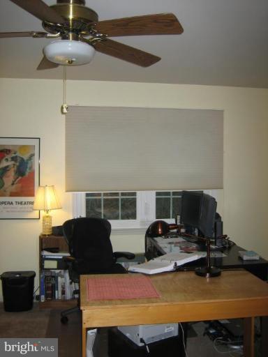 285 West Bay Front Road Lothian, MD 20711 - Photo 8 of 26 a view of a workspace with furniture