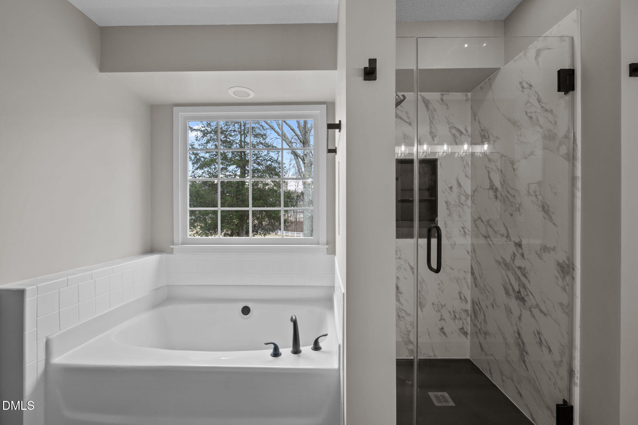 2008 Red Mountain Road Rougemont, NC 27572 - Photo 17 of 31 a bathroom with a bathtub and shower