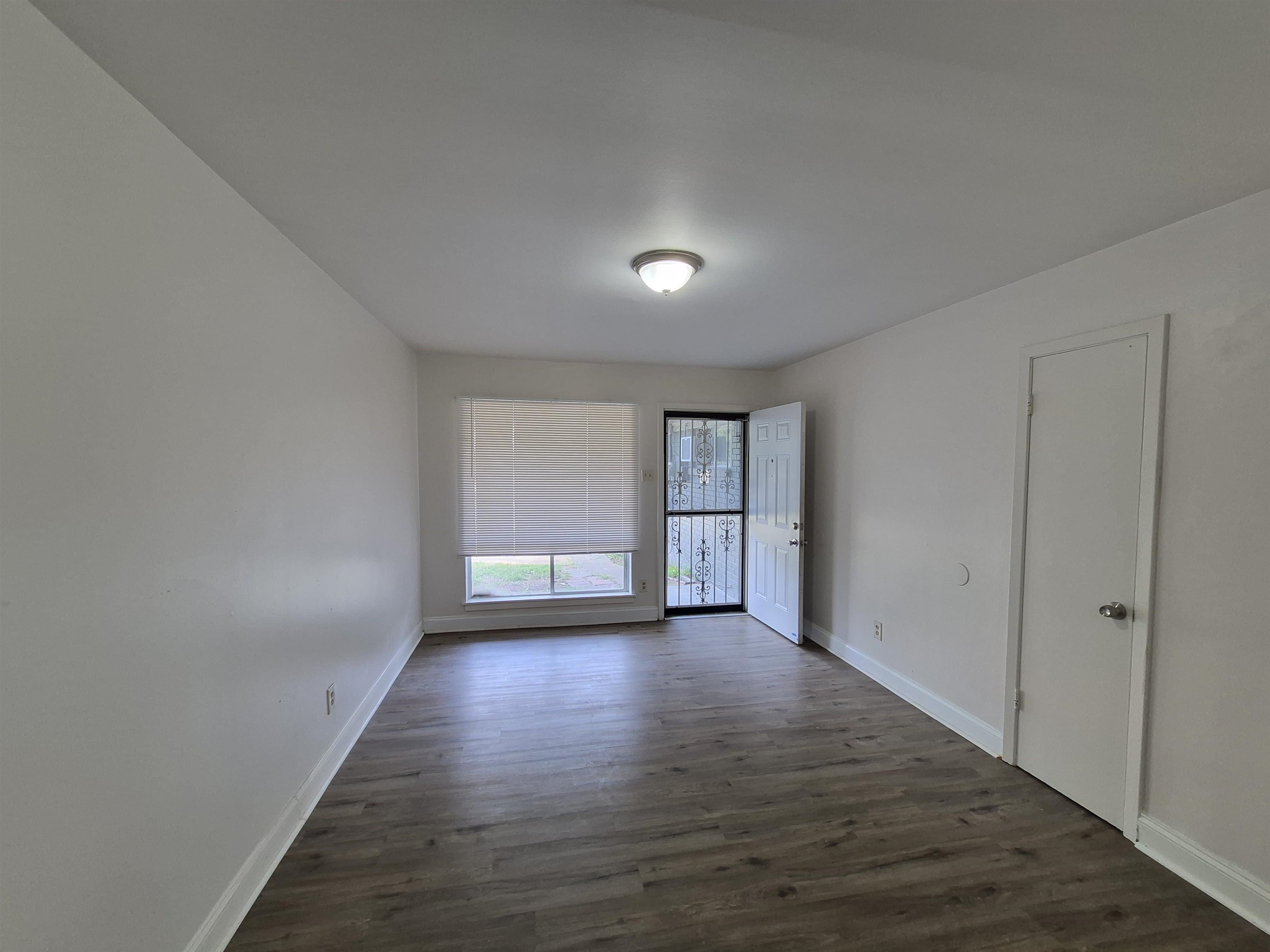3449 Tutwiler Avenue, Unit 3449 Memphis, TN 38122 - Photo 4 of 10 a view of empty room with wooden floor