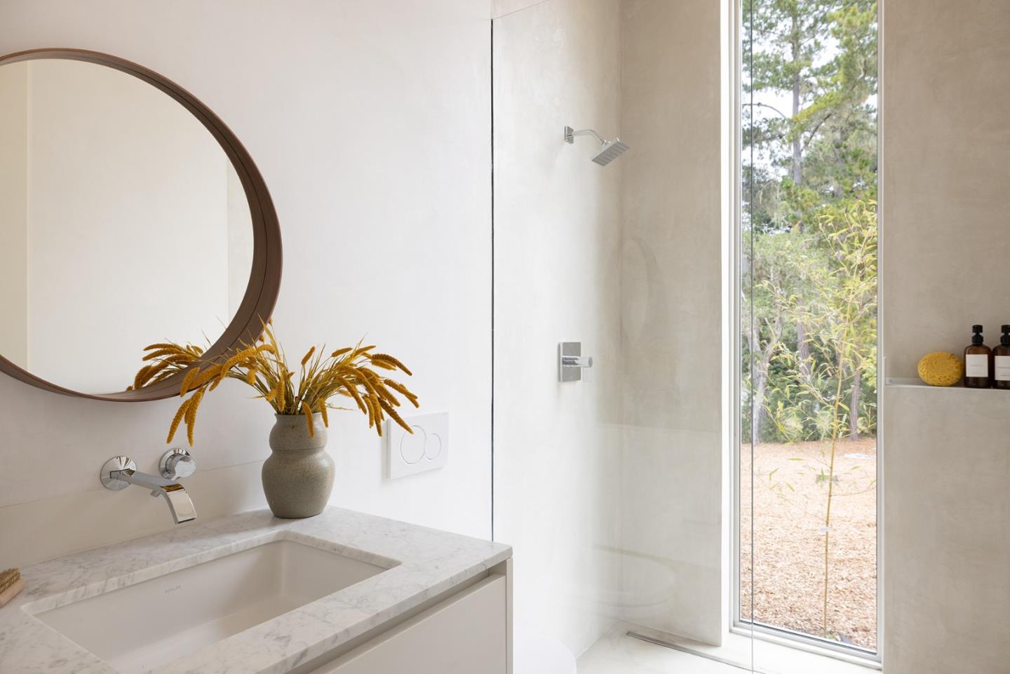 3159 Stevenson Drive Pebble Beach, CA 93953 - Photo 26 of 29 a bathroom with a sink and a mirror