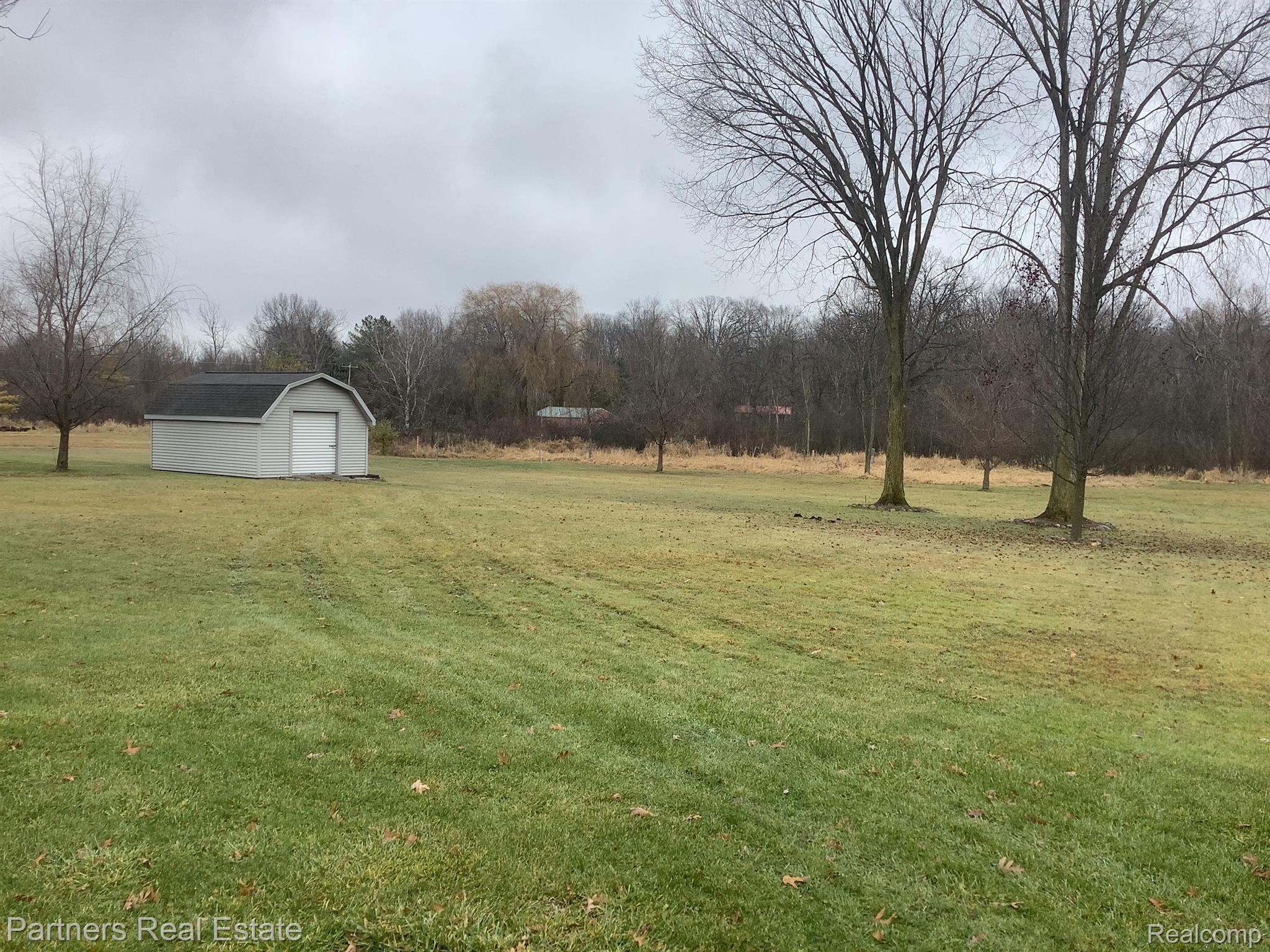 2349 Fisk Road Howell, MI 48843 - Photo 16 of 17 Scenic backyard with plenty of space