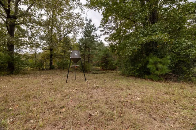 a view of a room with lots of tables and chairs