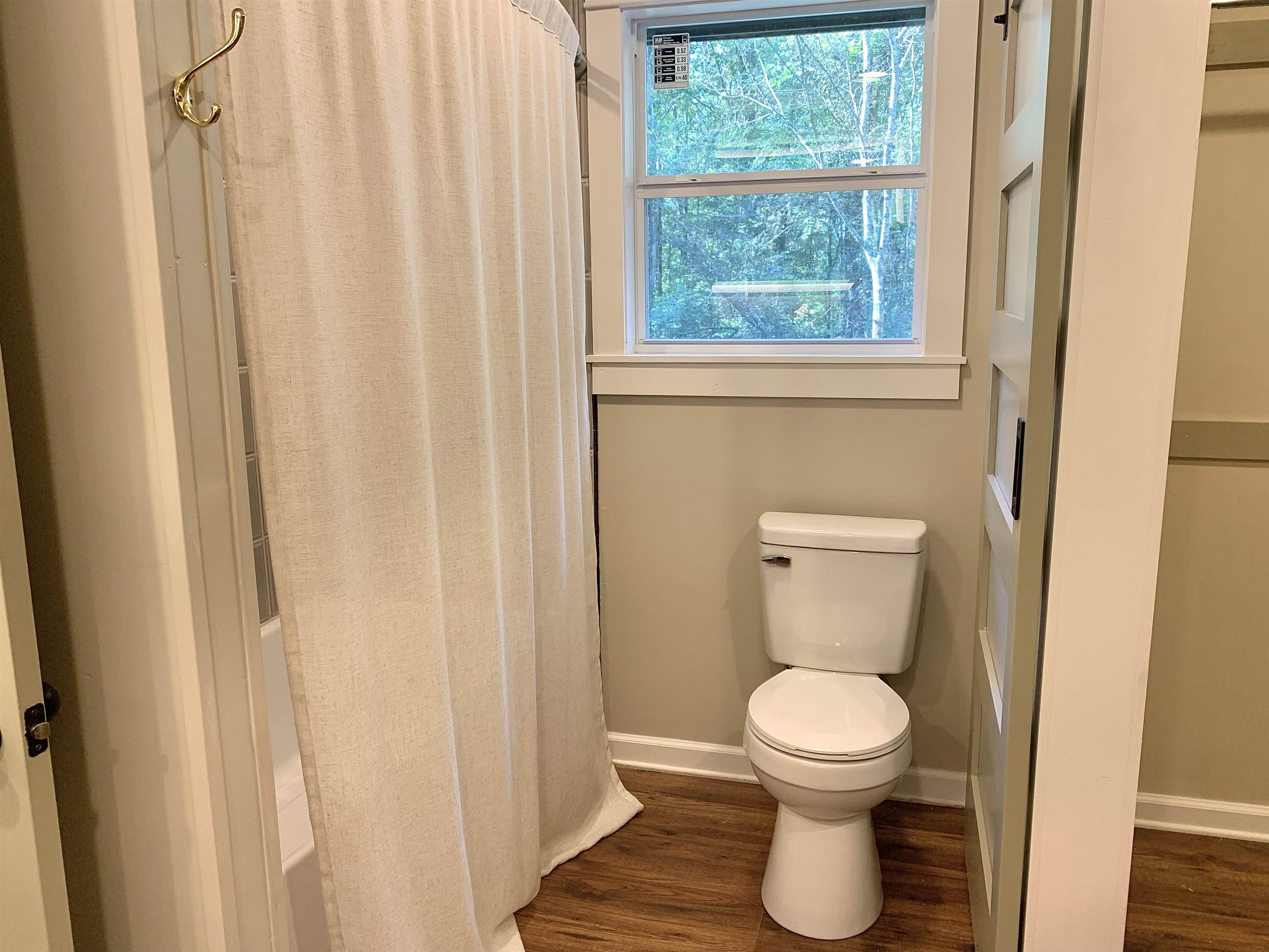 17 Cr 747 Road Walnut, MS 38683 - Photo 16 of 35 a bathroom with a toilet and a window