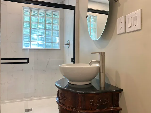 a bathroom with a toilet and a sink
