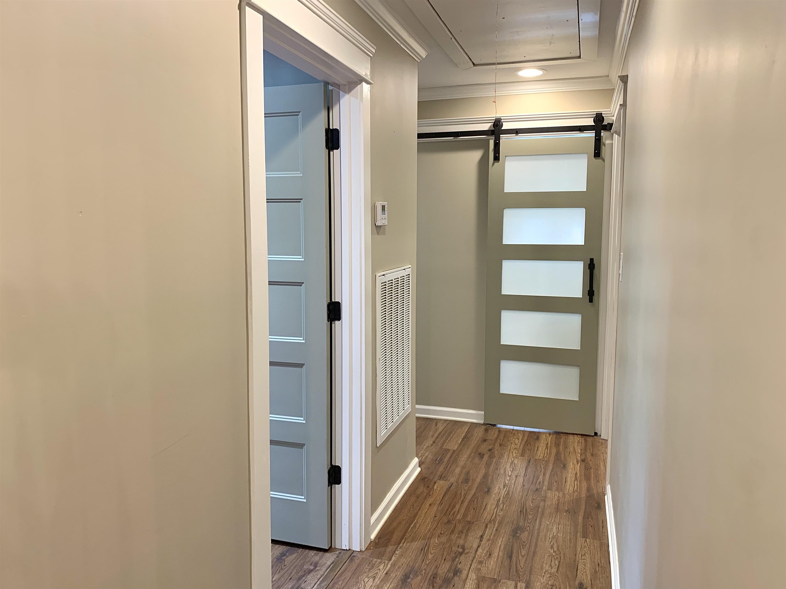17 Cr 747 Road Walnut, MS 38683 - Photo 26 of 35 a view of walk in closet with wooden floor