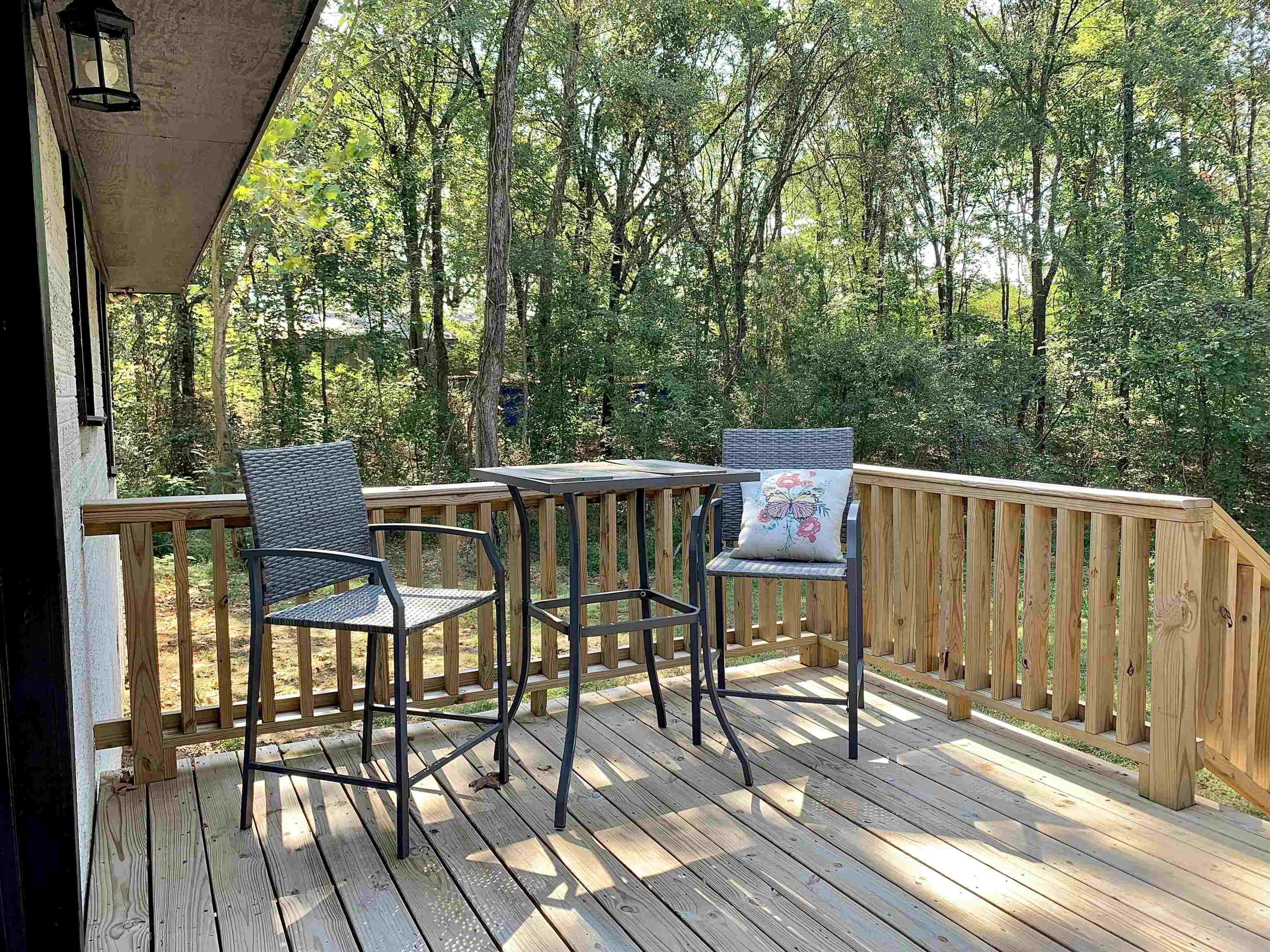 17 Cr 747 Road Walnut, MS 38683 - Photo 32 of 35 a view of a chairs and table on the wooden deck