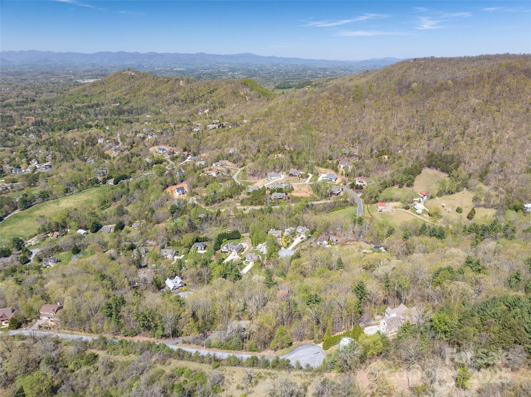 88 Courseview Drive, Unit 239 Weaverville, NC 28787 - Photo 9 of 16 a view of lake and mountain