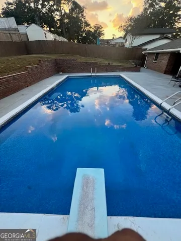 a front view of a house with yard